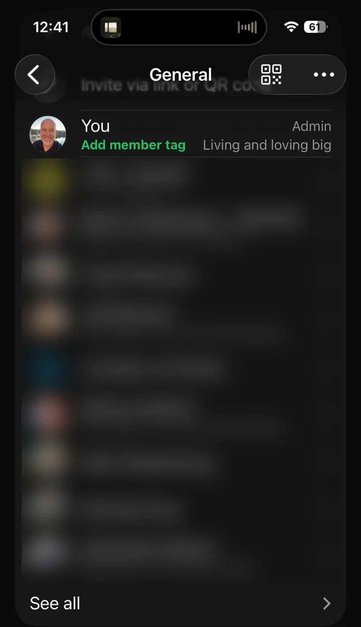 The members list of the private WhatsApp community, with member names and photos blurred for privacy