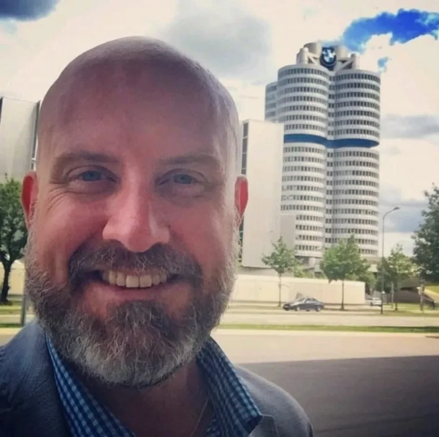 Angus Nelson outside the BMW headquarters tower in Munich